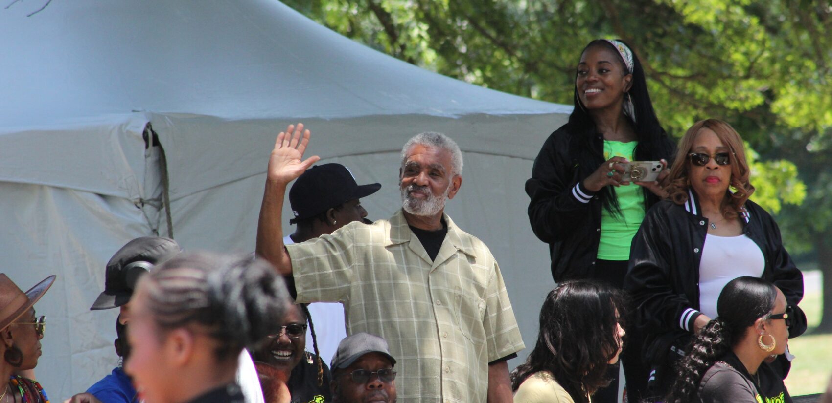 Thousands watched hundreds of people and floats make their way down 52nd Street on Sunday for Philadelphia's Juneteenth Parade and Festival. (Cory Sharber/WHYY)