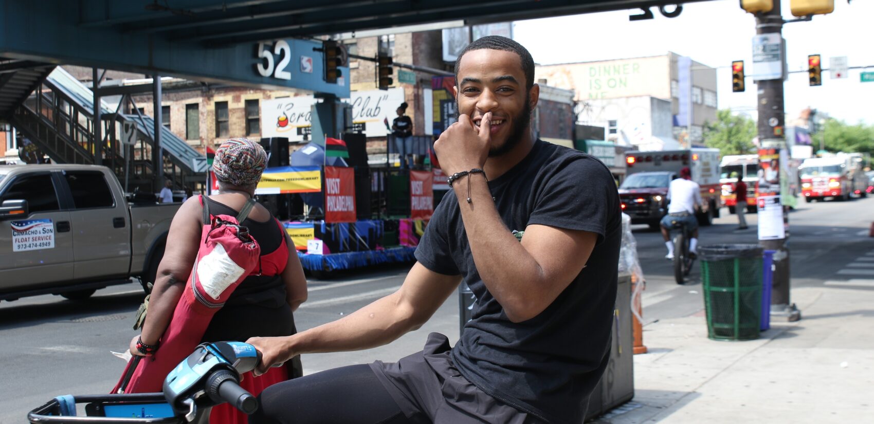 Thousands watched hundreds of people and floats make their way down 52nd Street on Sunday for Philadelphia's Juneteenth Parade and Festival. (Cory Sharber/WHYY)