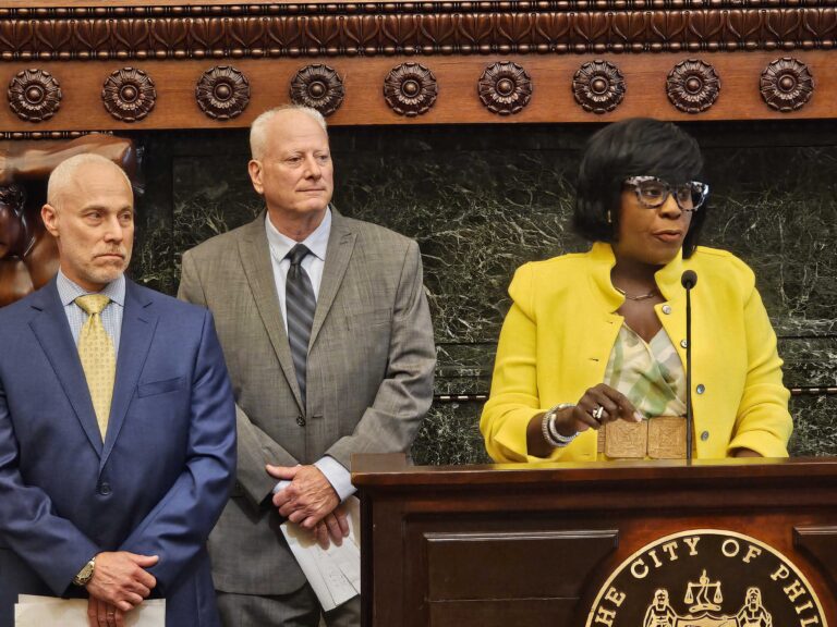 Mayor Cherelle Parker (right), Local 159(b) Eric Desiderio (middle) and Michael Resnik, prisons commissioner, speak at the arbitration announcement June 17, 2024. (Tom MacDonald, WHYY)