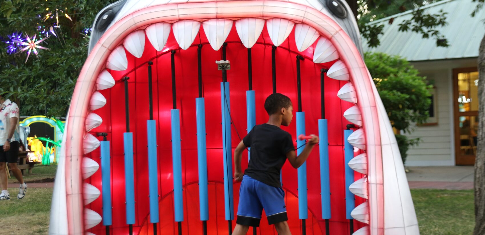 Interactive elements at the Chinese Lantern Festival allow for attendees to dance, play music and be dazzled by many of the handmade lanterns. (Cory Sharber/WHYY)