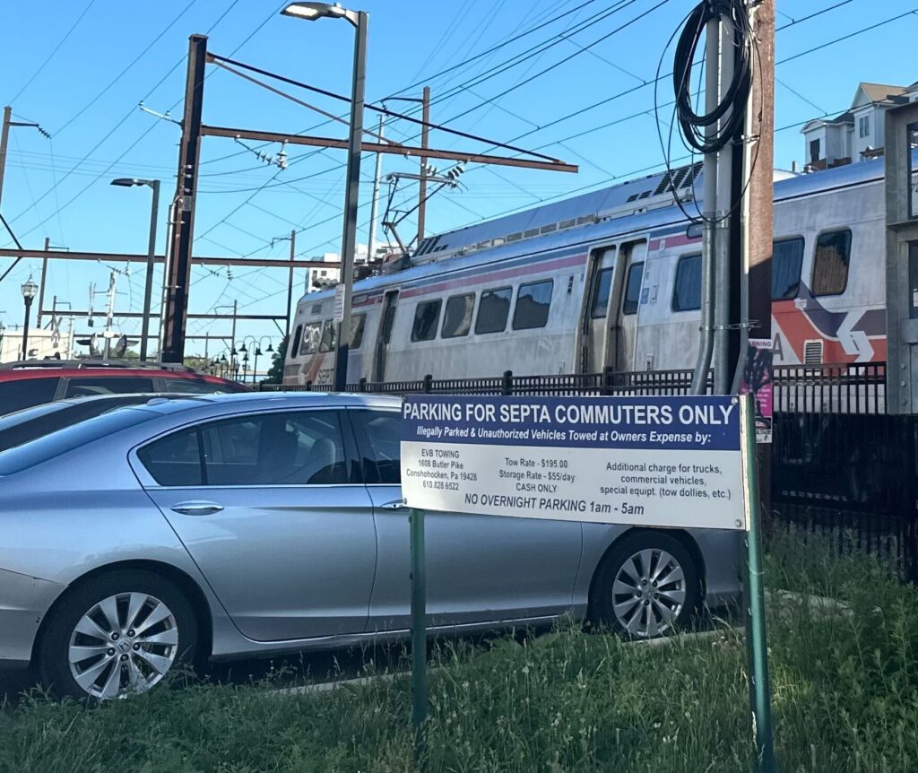 cars parked by a SEPTA train