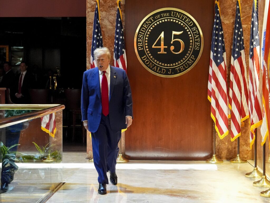 Trump Hush Money Trump walking inside Trump Tower