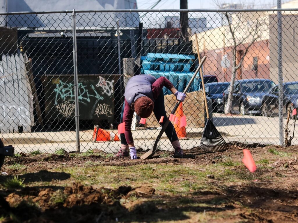 2019-04-29-a-gervasi-philadelphia-la-finquita-5 Jessica Noon, a former volunteer for La Finquita, helps prepare a new garden in 2019. (Angela Gervasi for WHYY)