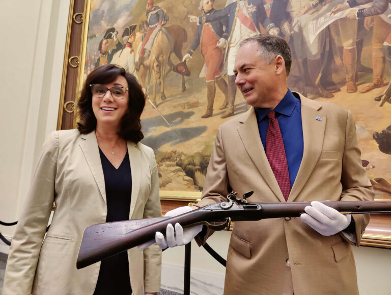 Maria Thackston and Scott Stephenson with the musket