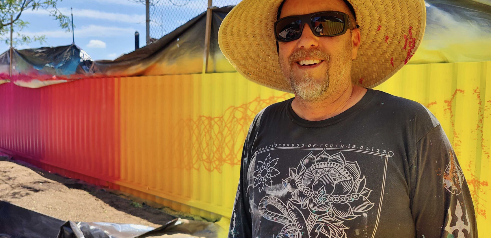 The commission to paint the garden wall at The Noble is artist Doug Hoekzema's first piece in Philadelphia. (Peter Crimmins/WHYY)