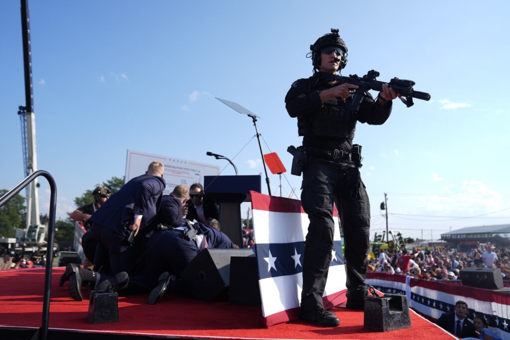 Secret Service with Trump after the shooting at his rally