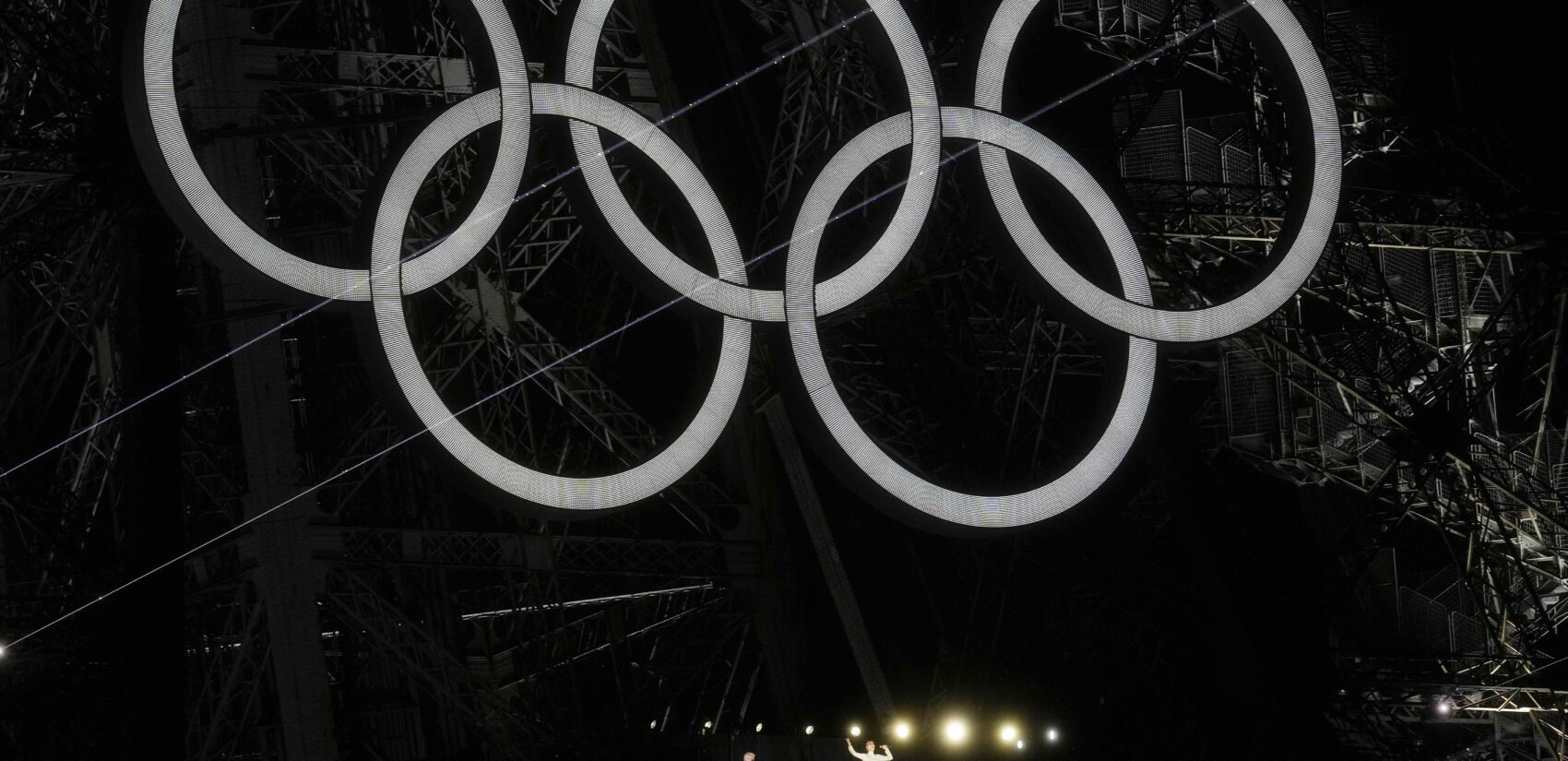 Singer Celine Dion performs from the Eiffel Tower in Paris, France, during the opening ceremony of the 2024 Summer Olympics, Friday, July 26, 2024. (AP Photo/Abbie Parr)