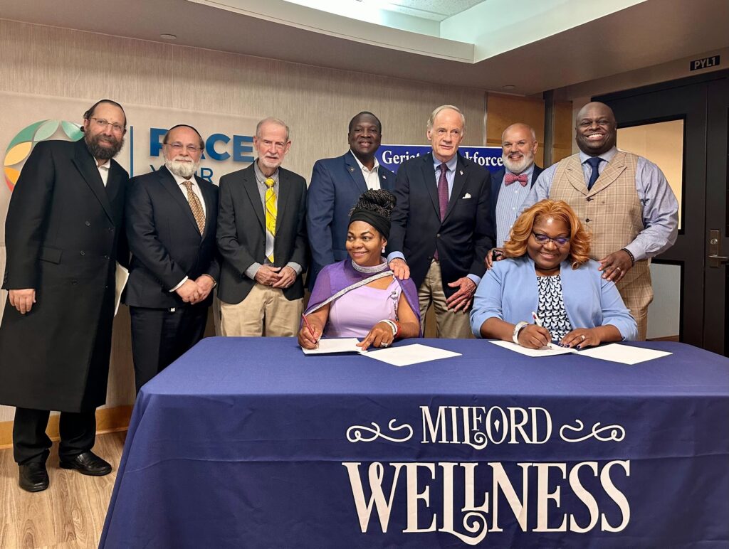 Geriatric-Workforce-Enhancement-Program-2 The official signing of the $5 million, five-year Geriatric Workforce Enhancement Program that will take place at the Milford Wellness Village, the projects base location. (Johnny Perez-Gonzalez/WHYY)