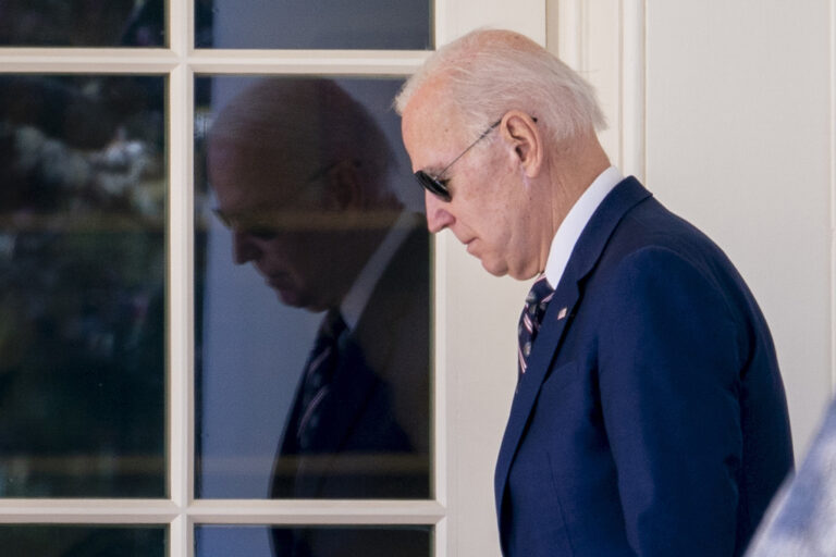 President Joe Biden walks out of the Oval Office of the White House in Washington