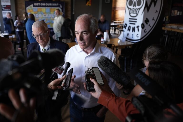 Sen. Bob Casey, D-Pa., speaks to reporters after a campaign event, Monday, July 1, 2024, in Scranton, Pa.
