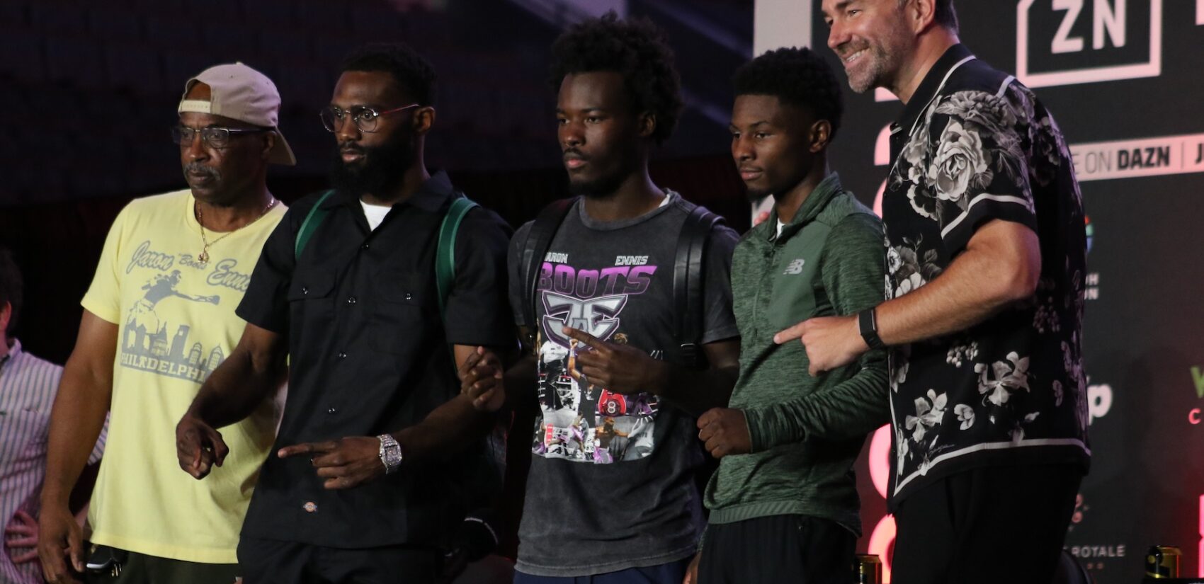 Bozy and Jaron Ennis, Ismail Muhammad, and Eddie Hearn pose for a photo at the press conference