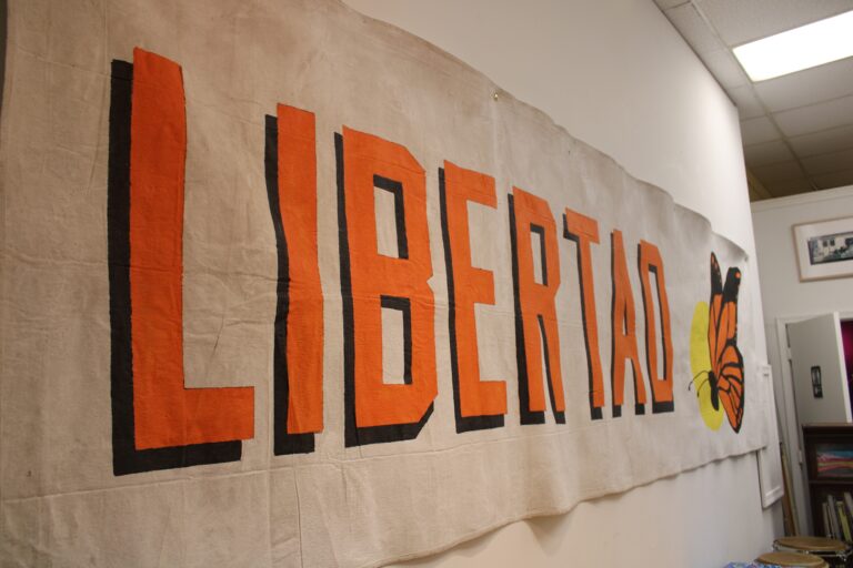 A sign from the Shut Down Berks Coalition on display at Imperfect Gallery.