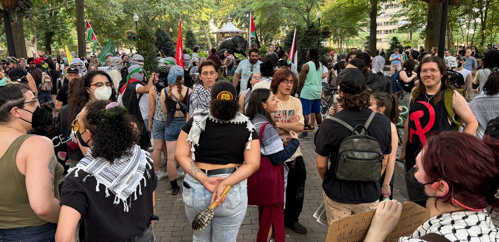 Hundreds rally at Rittenhouse Square on Thursday to condemn Israel’s Gaza occupation and demand an immediate cease-fire before marching to Center City. (Carmen Russell-Sluchansky)