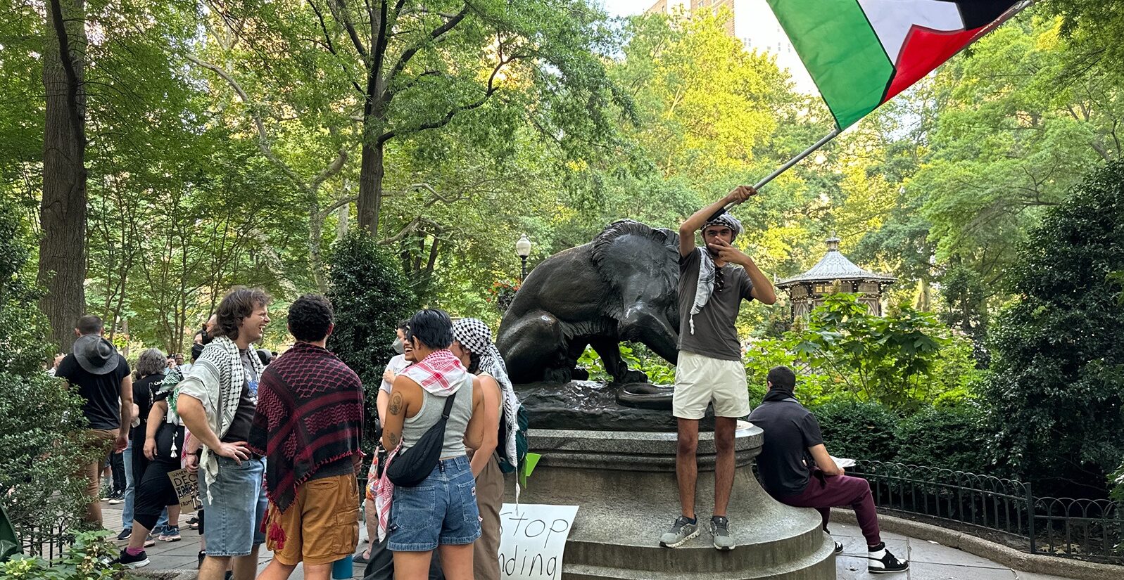 Hundreds rally at Rittenhouse Square on Thursday to condemn Israel’s Gaza occupation and demand an immediate cease-fire before marching to Center City. (Carmen Russell-Sluchansky)