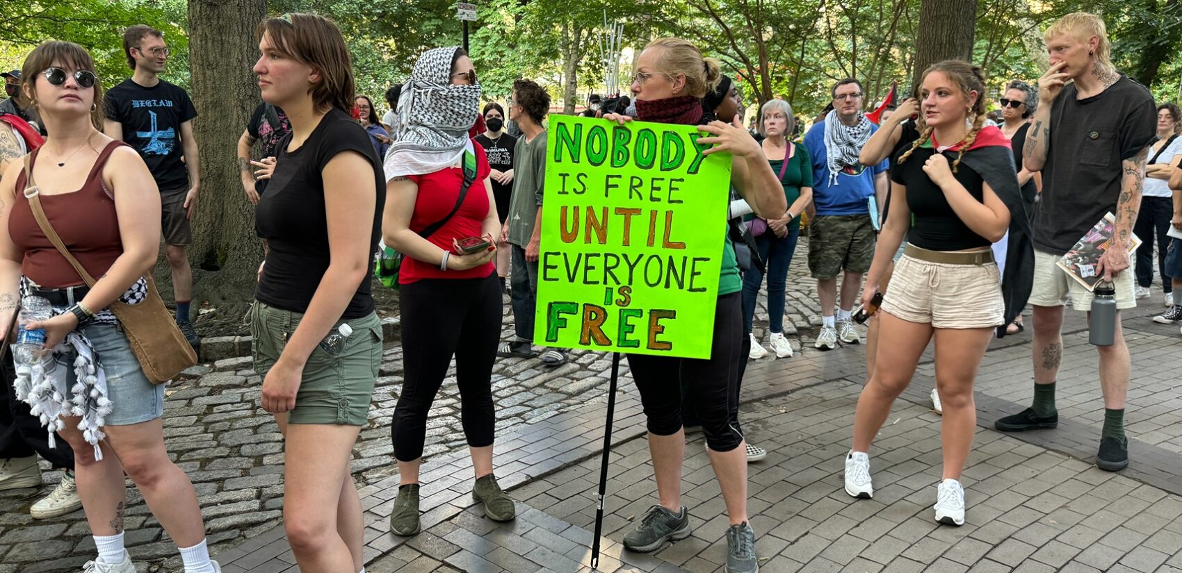 Hundreds rally at Rittenhouse Square on Thursday to condemn Israel’s Gaza occupation and demand an immediate cease-fire before marching to Center City. (Carmen Russell-Sluchansky)