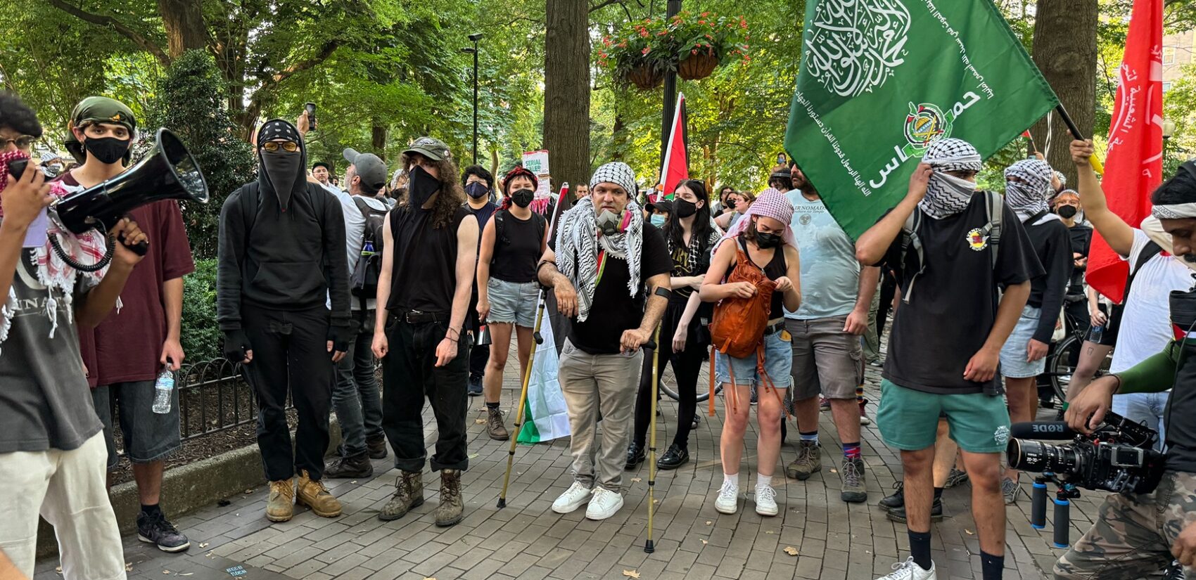 Hundreds rally at Rittenhouse Square on Thursday to condemn Israel’s Gaza occupation and demand an immediate cease-fire before marching to Center City. (Carmen Russell-Sluchansky)