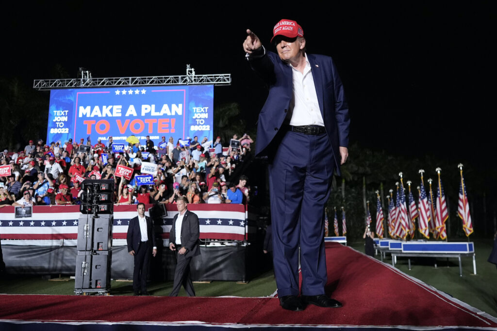 Donald Trump on stage at a rally