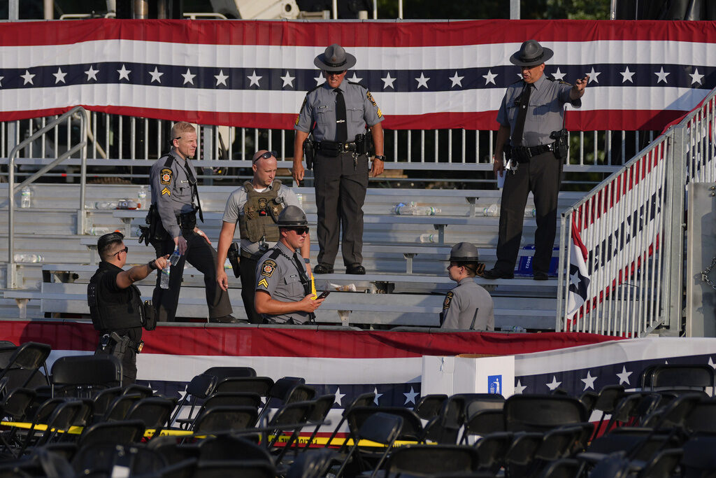 APTOPIX Election 2024 Trump Law enforcement officers gather at the campaign rally site for Republican presidential candidate former President Donald Trump Saturday, July 13, 2024, in Butler, Pa. (AP Photo/Evan Vucci)
