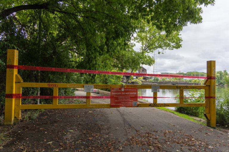 A sign shows that part of Bartram' Garden Hiking trail is closed