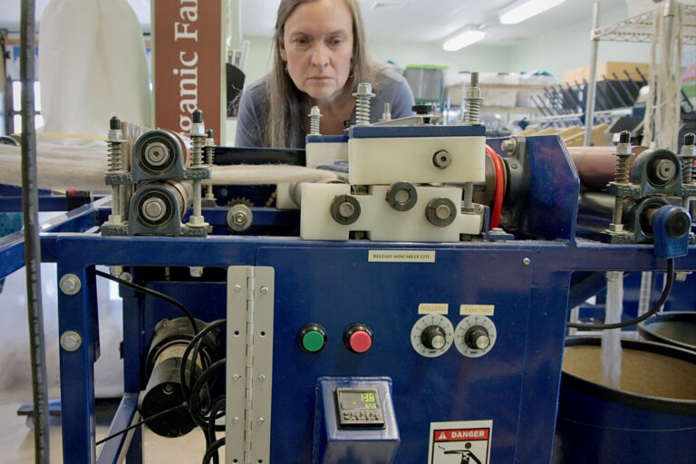 Susan Phillips looks at a draw frame
