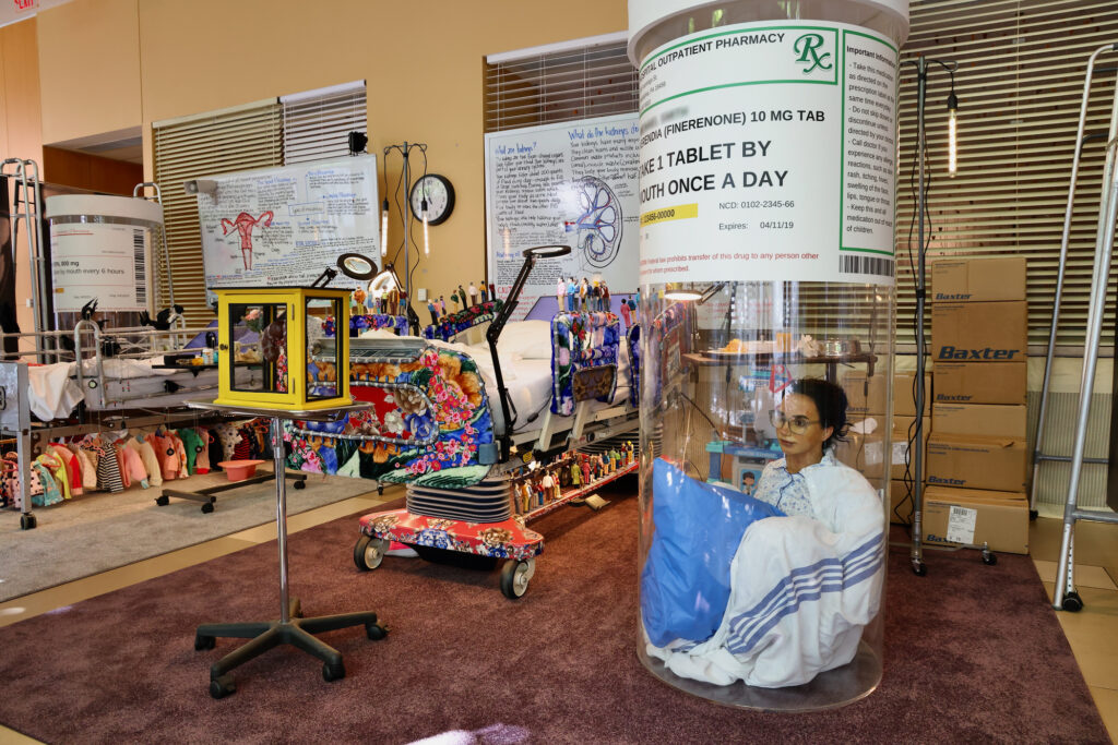 2024 08 27-e lee-philadelphia jefferson hospital-convalescence art exhibit pill bottle message Part of the display