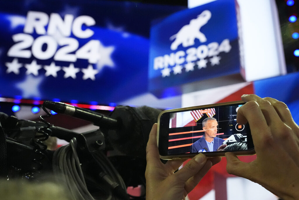 Corey Lewandowski Corey Lewandowski is seen on the screen of a cellphone during a walkthrough at the 2024 Republican National Convention, Sunday, July 14, 2024, in Milwaukee. (AP Photo/Nam Y. Huh)