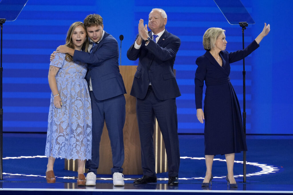 Tim Walz on stage with his family