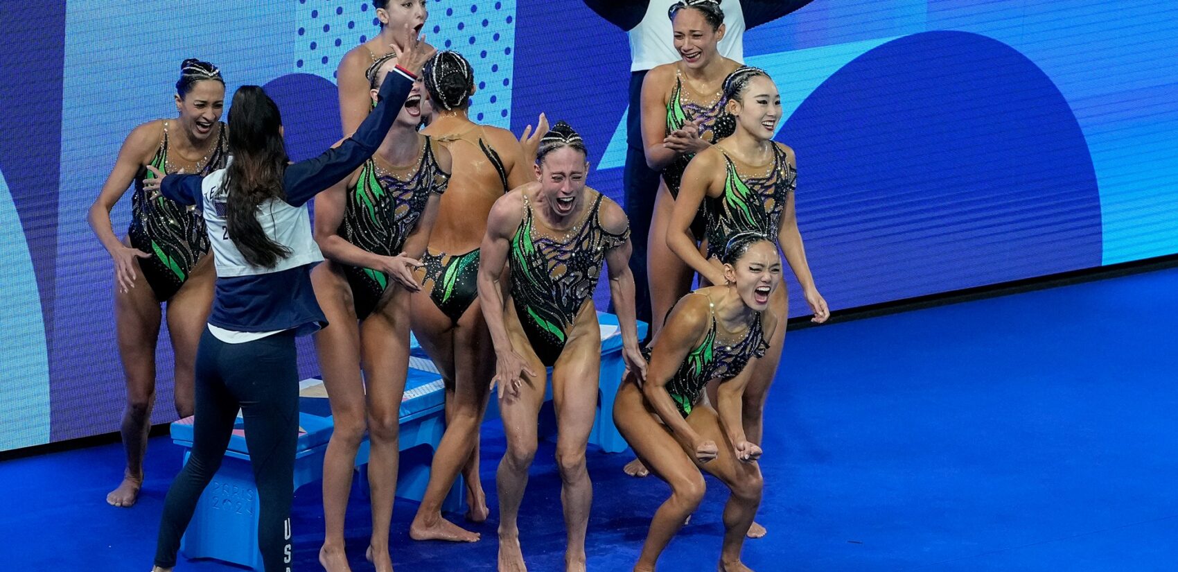 The U.S. team shouting in excitement