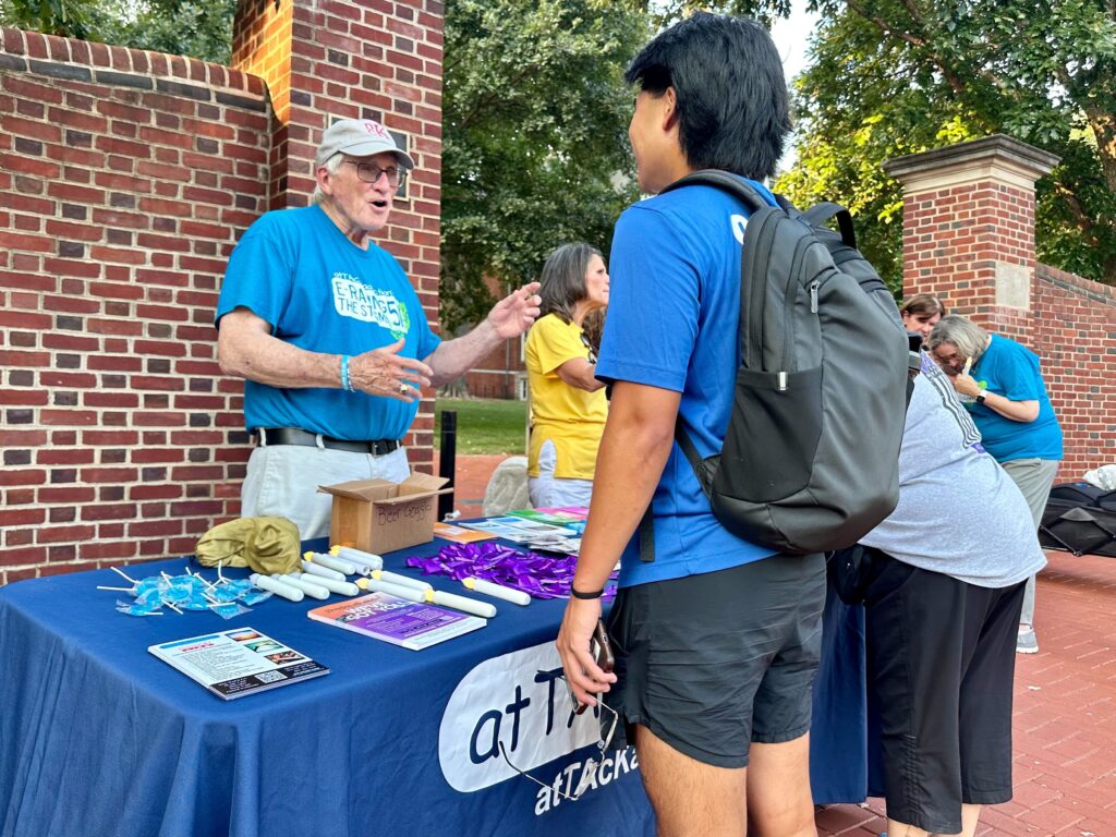 Don Keister speaking with a student