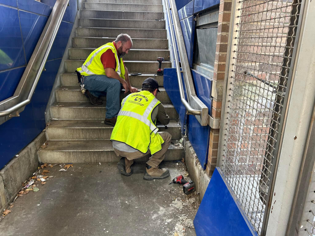 cat-rescue-63rd-station-septa SEPTA workers rescue cats from behind a stairwell