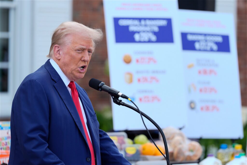 donald-trump-2024-08-15 Donald Trump speaks behind a microphone