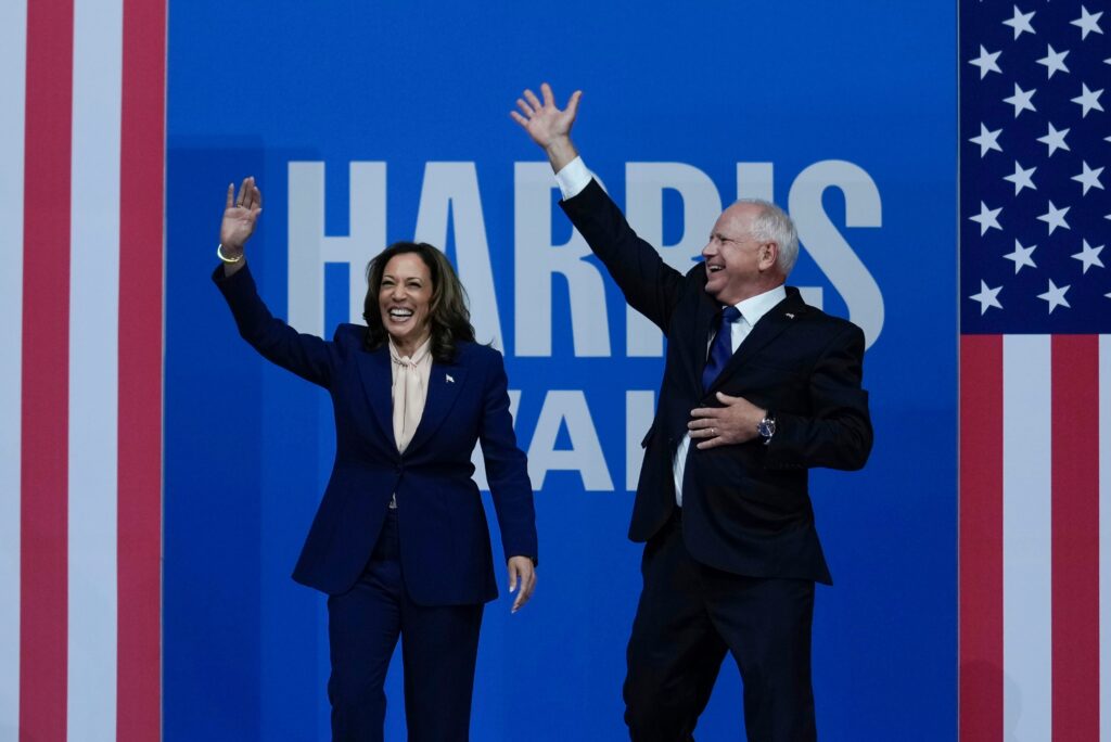 harris-walz-rallies Kamala Harris and Tim Walz wave