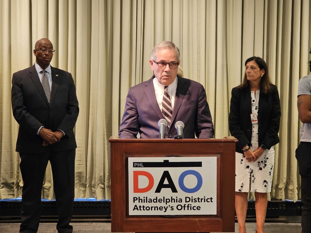 larry-krasner-2024-08-12 Larry Krasner behind a podium