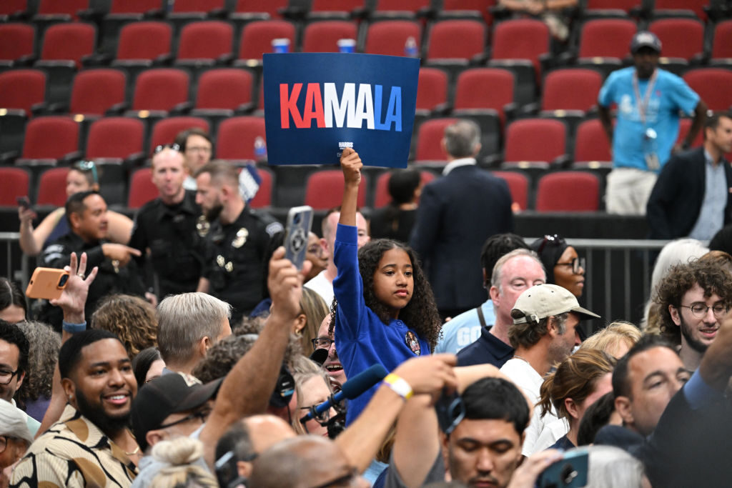 US-VOTE-POLITICS-HARRIS-WALZ A supporter holds up a sign that reads ''Kamala''