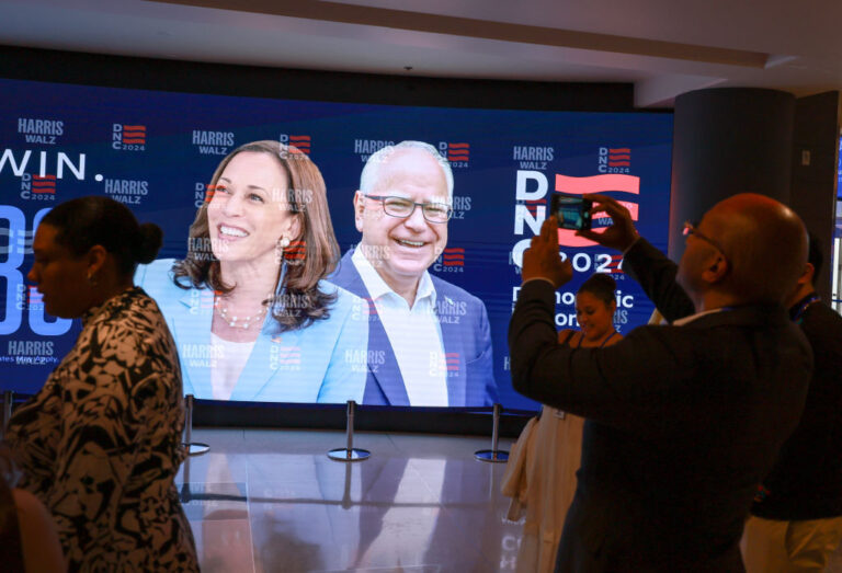 Sign with Kamala Harris and Tim Walz