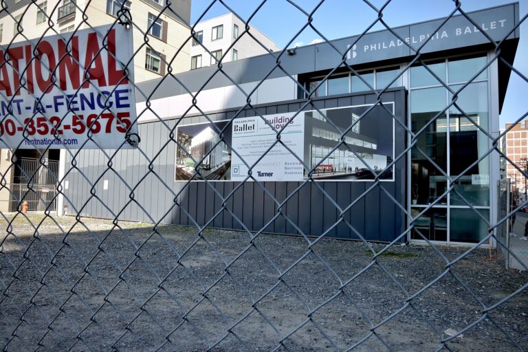 the Philadelphia Ballet building behind a fence
