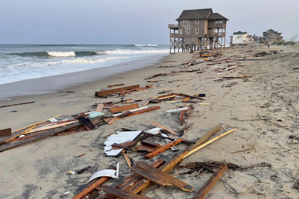 Beach house debris on the beach