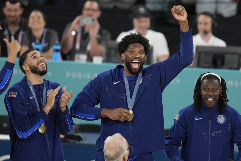 usa-basketball-gold-medal-ap-2024-08-12 Joel Embiid celebrating during the medal ceremony