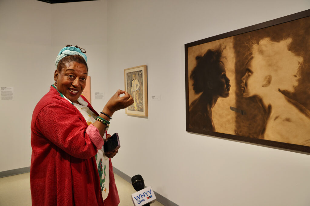 2024 09 13-e lee-cch pounder-philadelphia african american museum-cch pounder collection deep CCH Pounder in front of an art piece