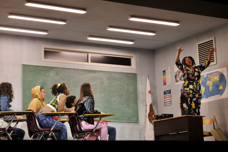 Nicole Heaston acting as a teacher with students