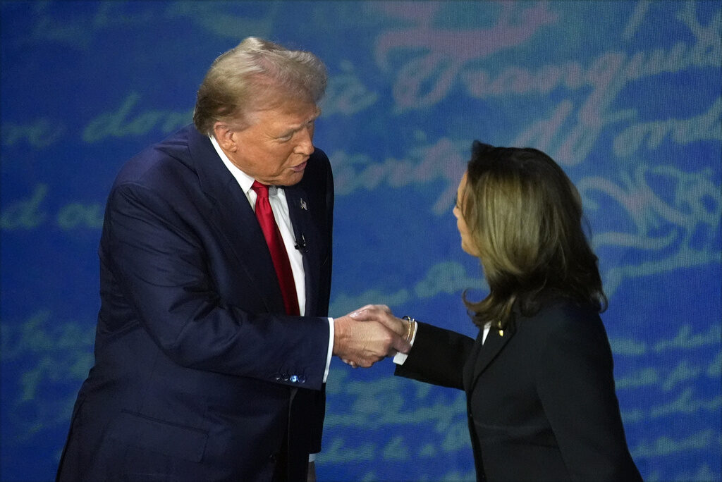 Election 2024 Debate Republican presidential nominee former President Donald Trump shakes hands with Democratic presidential nominee Vice President Kamala Harris during an ABC News presidential debate at the National Constitution Center, Tuesday, Sept.10, 2024, in Philadelphia. (AP Photo/Alex Brandon)