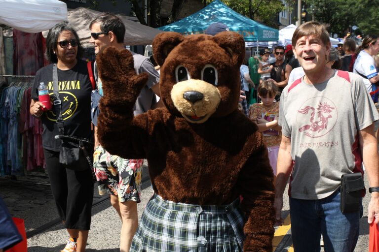 a person in a bear costume in the crowd