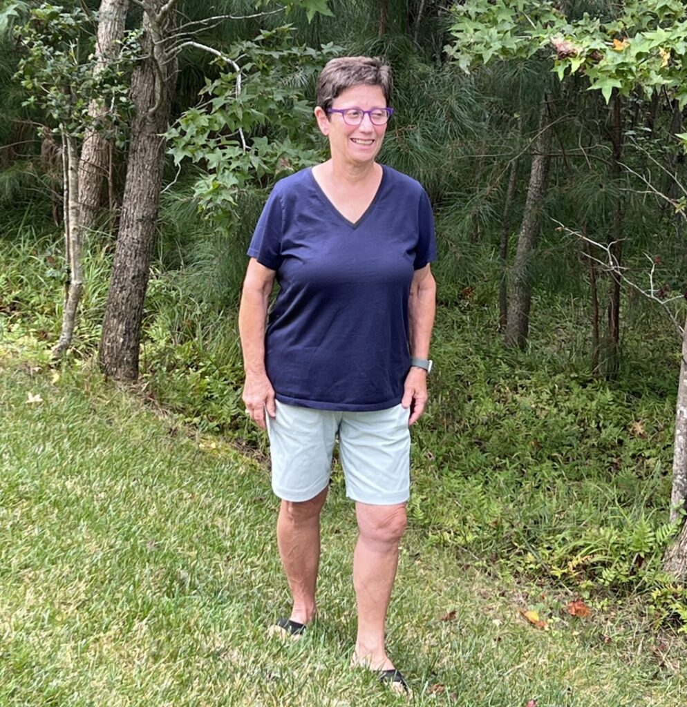 Jane Gruenebaum standing near the forest