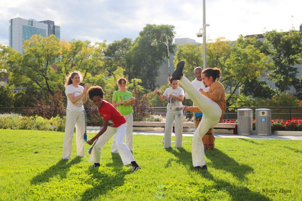Project-Capoeira-scaled people participate in a roda