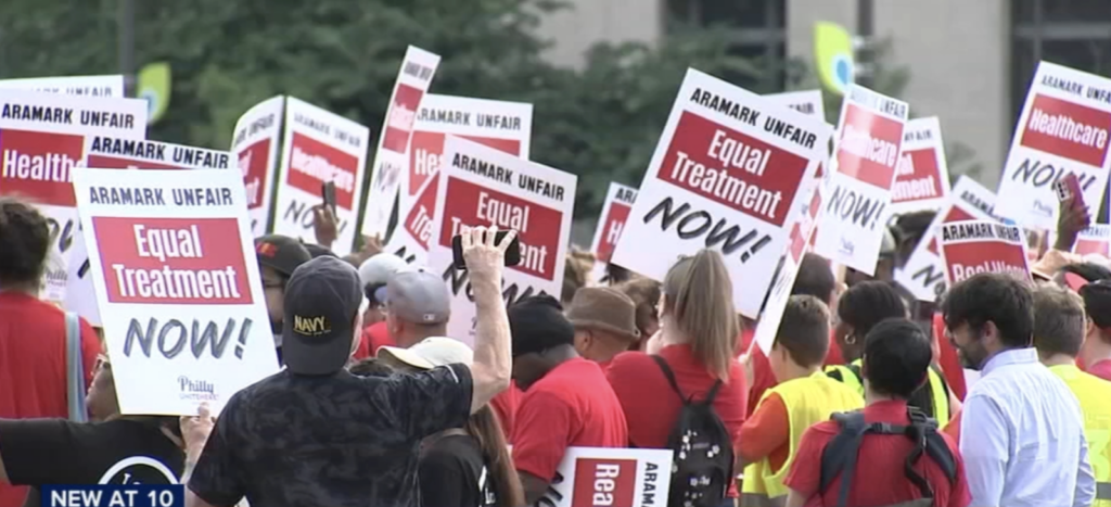 aramark-strike-wpvi Aramark workers hold up protest signs