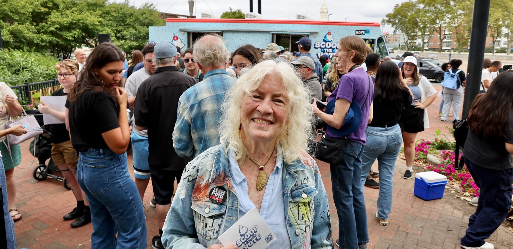 Judy Wicks smiles in a crowd