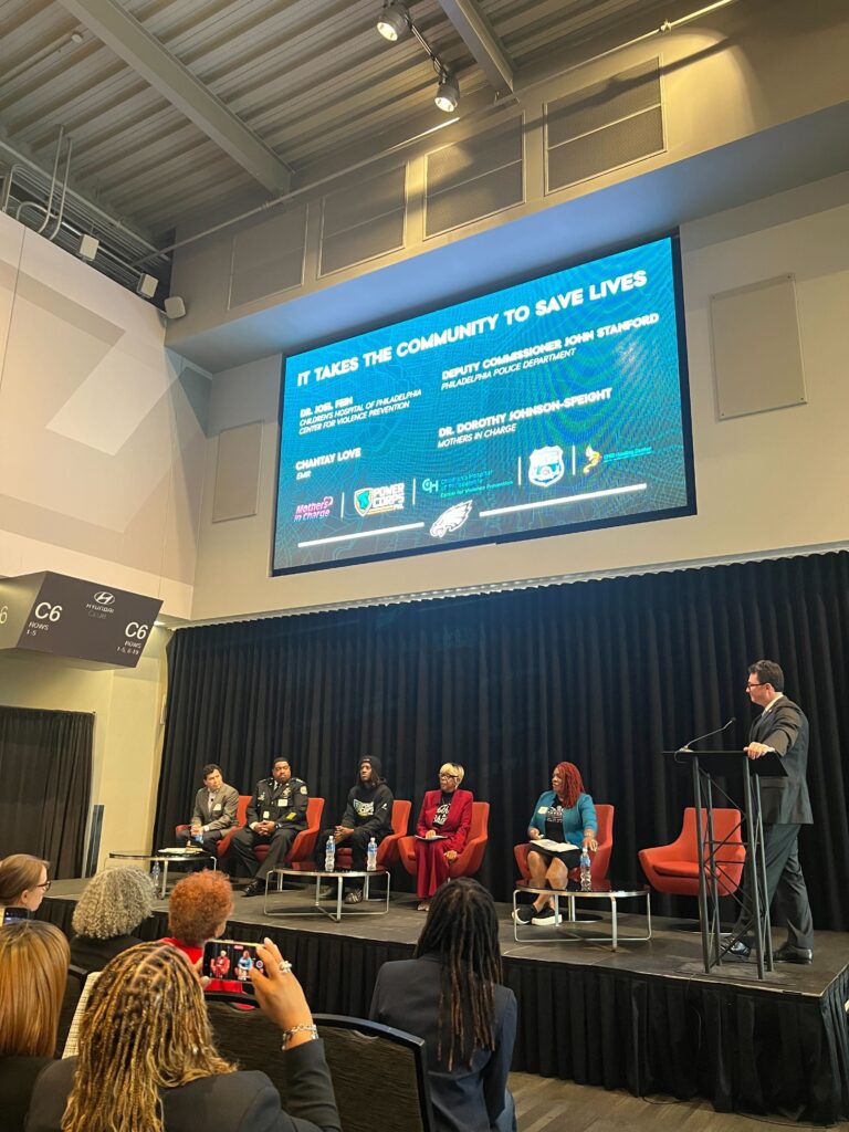 a panel sits onstage