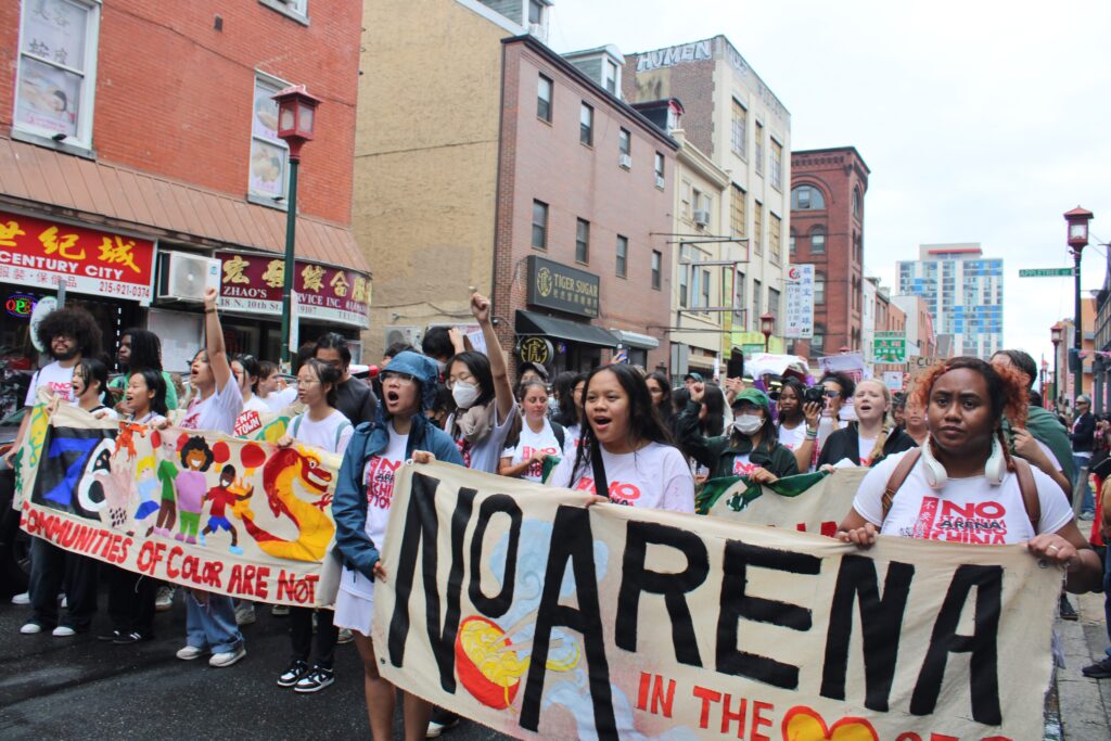 save-chinatown-21 People march against the proposed new 76ers arena near Philadelphia's Chinatown neighborhood