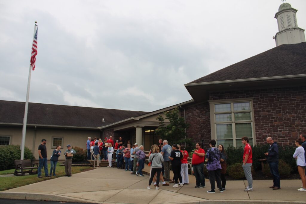 souderton-school-board-meeting-4 People line up outside a school board meeting in Souderton