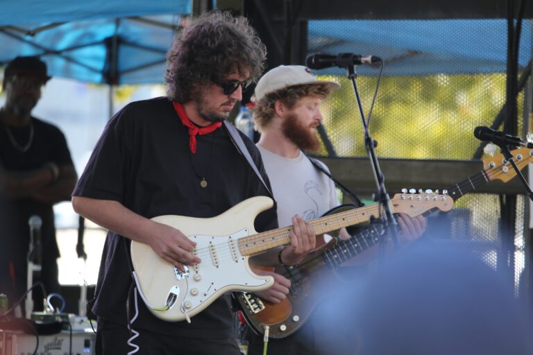 The Heavy Heavy guitarist playing